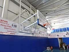 Basketbol Potası Duvara Montaj Yükseklik Ayarlı Katlanabilir Elektrik Tüp Motorlu  20 mm Cam (Ak) Panya  105 x 180 cm